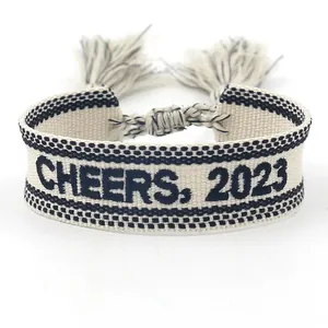 Embroidered cheers 2023 woven tassel bracelet with adjustable sliding cord for women