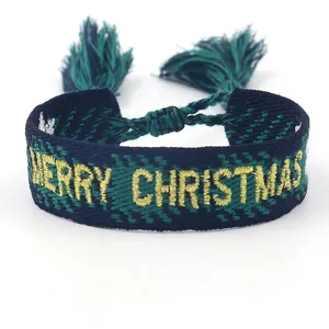 Colorful Merry Christmas woven friendship bracelet with golden embroidery and tassels