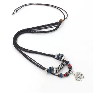 Tribal multilayer leather rope necklace with colorful beads and silver feather pendant