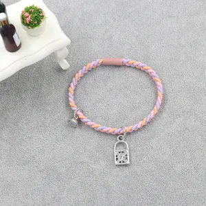 Colorful woven friendship bracelets with magnetic heart and rhinestone lock charm
