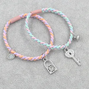 Colorful woven friendship bracelets with magnetic heart key and lock pendants