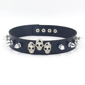 Gothic punk leather choker with silver skull studs and adjustable buckle on white background