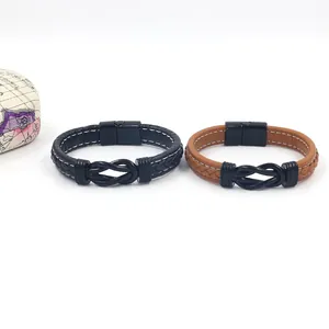 Close-up of woven leather bracelets with metal knots and magnetic clasp detail