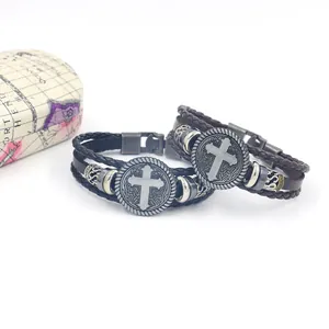 Retro multi-layer leather bracelet with vintage metal cross charm and woven cord design