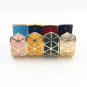 Wide gold metal open cuff bracelets with colorful PU leather and geometric triangle cutouts