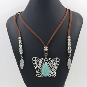 Bohemian butterfly pendant necklace with turquoise stone and brown leather cord