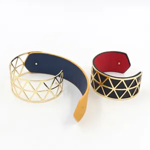Women's gold hollow triangle cuff bangle featuring reversible colorful PU leather inserts