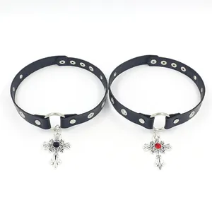 Macro view of adjustable punk choker set with silver cross pendants and faux gemstones