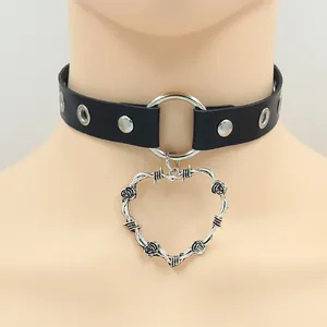 Punk leather choker with silver metal ring and rose heart pendant on a model