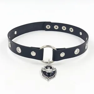 Detail of gothic leather choker with silver bat pendant and black gemstone inlay
