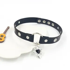 Punk black PU leather choker with metal grommets and radiant heart pendant