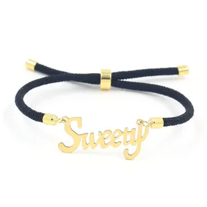 Bracciale nero intrecciato regolabile con ciondolo Sweety dorato e chiusura in acciaio