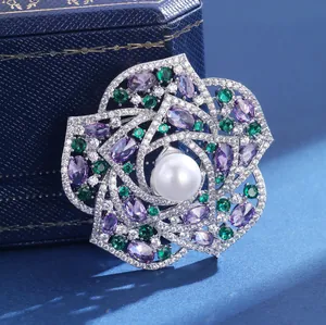 Classic camellia flower brooch with colorful cubic zirconia and a large white pearl