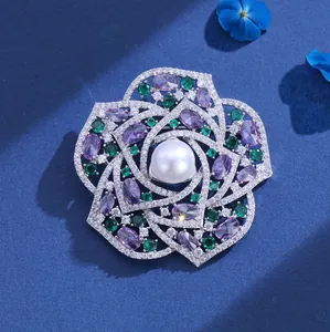 Elegant camellia flower brooch with white pearl, purple gems and pavé zircon stones