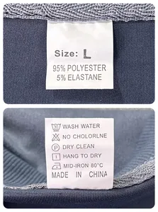 Macro shot of garment care label showing size L and 95% polyester material composition