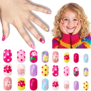 Kids press-on nails set with colorful floral and polka dot patterns for children