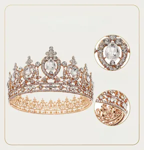Close-up of golden Baroque crown featuring sparkling teardrop crystals and alloy base