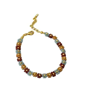 Handmade bohemian beaded flower bracelet with sunset colors and gold lobster clasp