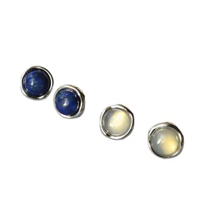Minimalist silver earrings with round blue lapis and white moonstone in irregular frames