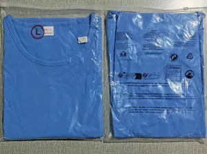 Detail of light blue sleeveless shirt in packaging with 100% polyester label and size L