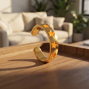 Detailed close-up of orange enamel star on a gold adjustable open ring for women