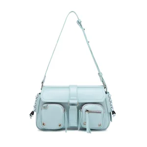 Detail view of mint blue Y2K baguette bag with multi-pockets and metal buckles