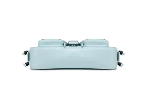 Detailed bottom view of light blue leather baguette bag showing fine stitching and hardware