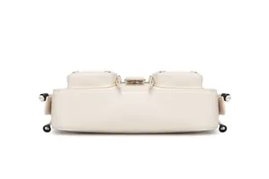 Close-up of a white leather baguette bag featuring side pockets and round black buckles