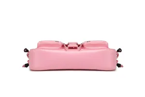 Detailed bottom view of pink cargo shoulder bag featuring dual utility pockets