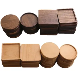 Set of round and rectangular solid wood coasters in walnut and beech wood finishes