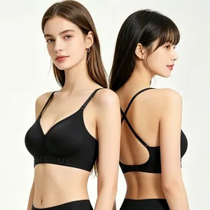 Close-up of black seamless sports bra with wide support band and V-neckline detail