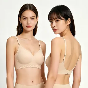 Detailed view of seamless beige bra with Graceful embossed band and thin straps