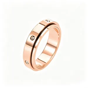 Close-up of rose gold rotating ring featuring black line detail and inlaid crystal stones