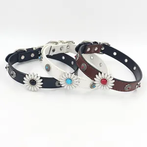 Close-up of leather choker with retro sunflower charms and metallic rivet studs
