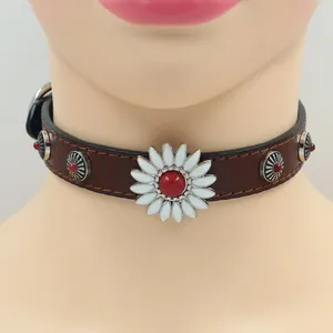Detailed shot of brown leather choker featuring white daisy floral and silver metal studs