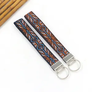 Cordones de muñeca retro con jacquard geométrico étnico y llaveros metálicos de plata