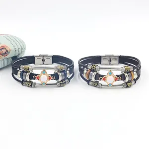 Detail of vintage bohemian leather bracelets with opal stone and stainless steel buckle