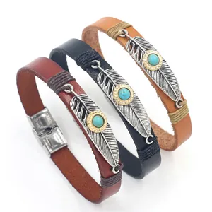 Bohemian leather bracelet set with turquoise stones and metal feather charms