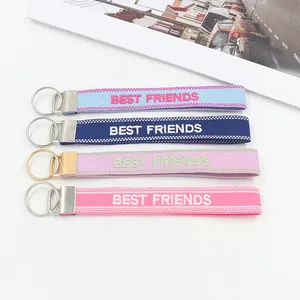 Colorful BEST FRIENDS embroidered jacquard ribbon keychains in four pastel colors