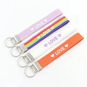 Llaveros de muñeca bordados LOVE de estilo étnico en cuatro patrones coloridos