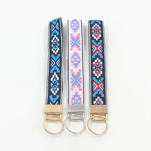 Cinturini etnici in nastro jacquard geometrico con anelli portachiavi in metallo misto