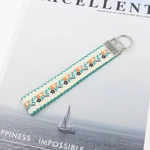 Portachiavi etnico con ricamo floreale e nastro jacquard da 25mm in stile vintage