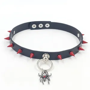 Gothic punk black leather choker with red spikes and a silver spider pendant