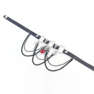 Gothic leather choker with red gemstone, metal spider pendant, skulls, and multi-layer chains