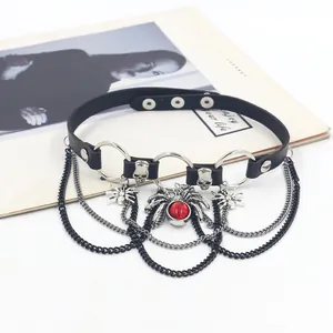 Gothic leather choker with silver skull pendants and red jewel spider charms