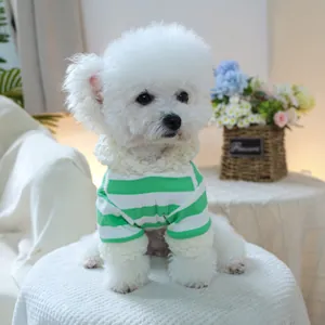 Detail of green and white striped pet hoodie with soft white faux shearling trim accents