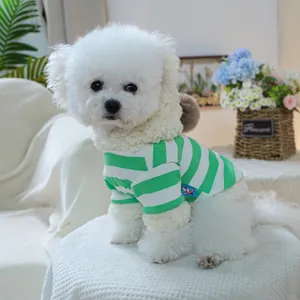 Close-up of green striped pet hoodie with cozy white lamb wool lining for small dogs