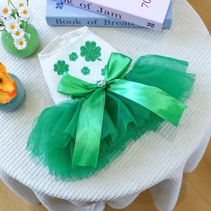 Cute St. Patrick's Day pet dress with clover sequins, satin bow and green tulle skirt
