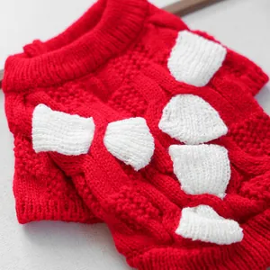 Red cable knit dog sweater with white patches for small pets festive New Year outfit