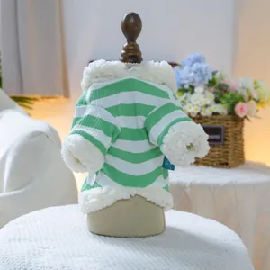 Detail of green and white striped pet hoodie with soft white faux shearling trim
